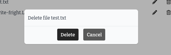 A pop up that says Delete file text.txt, with the buttons Delete and Cancel below it.